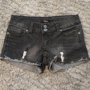 Distressed black denim shorts